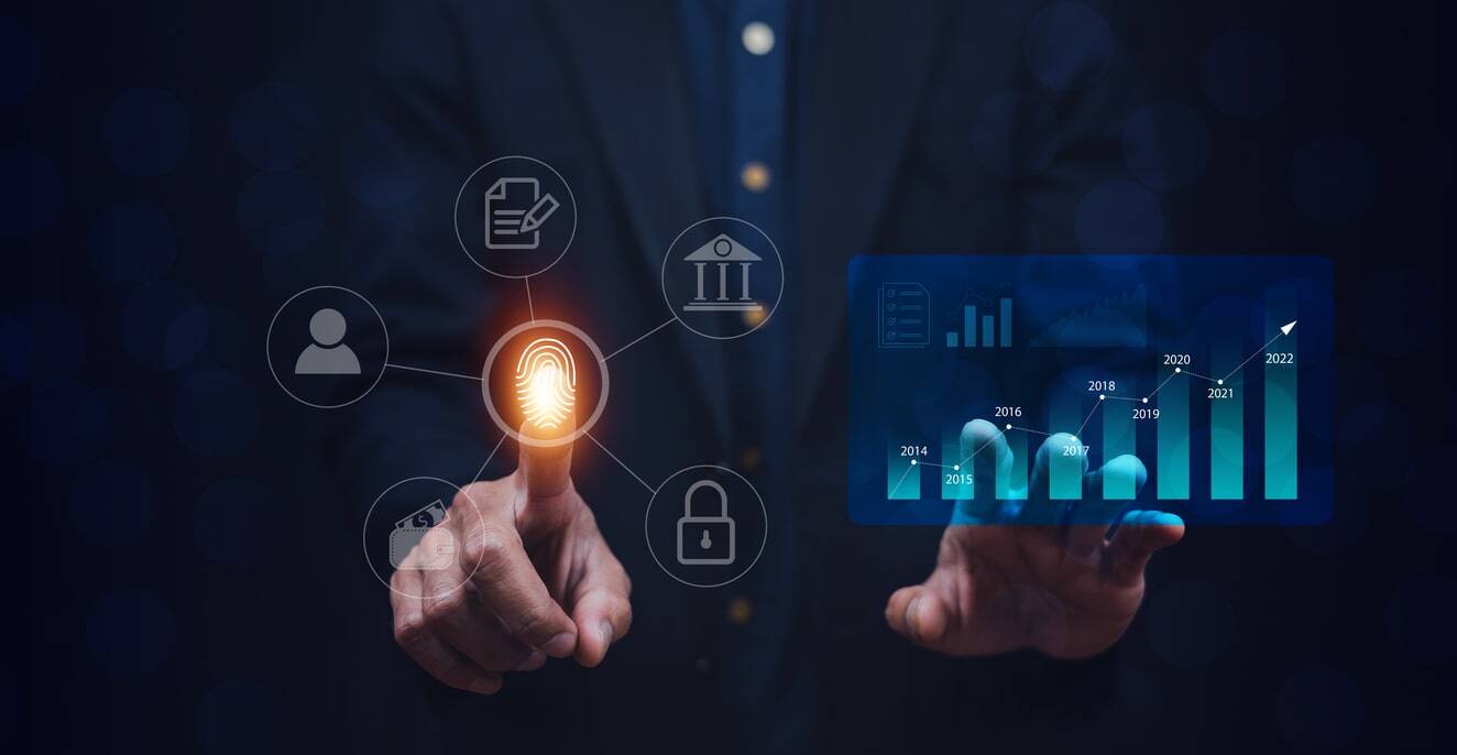 A business professional interacting with digital icons representing CRM, security, portfolio management, and a graph showcasing growth trends.