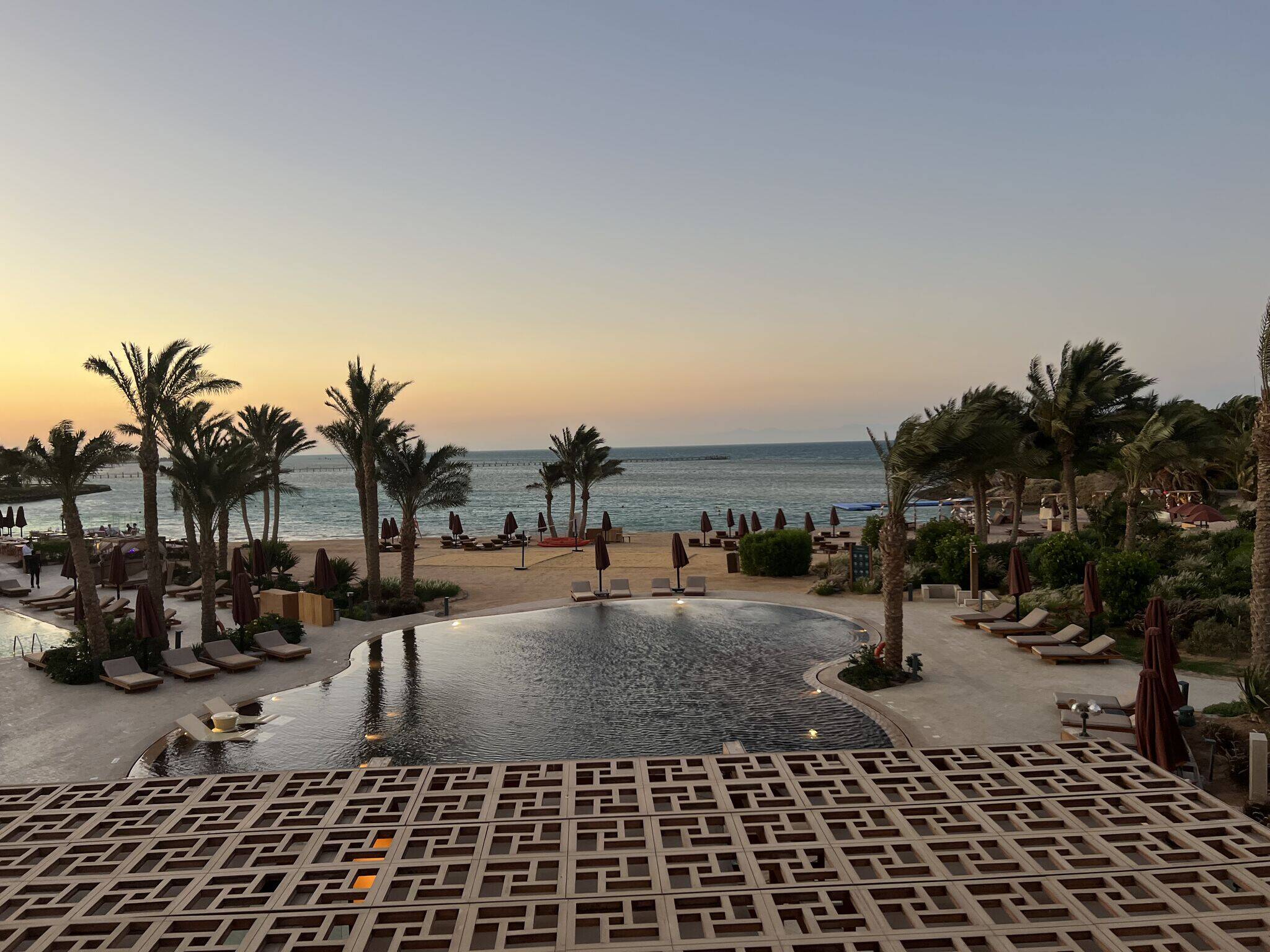 Sunset at El Gouna beach resort representing visionary design and structured living, echoing Swiss wealth management values.